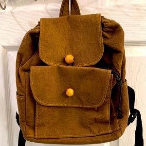 Rich Cognac Brocade Backpack with Multiple Pockets